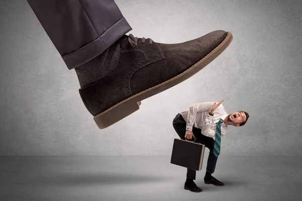 Employee afraid of the big boss foot — Stock Photo, Image