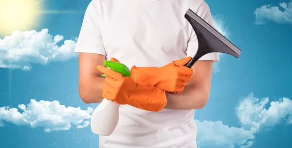 Sunny concept with housekeeper and orange gloves — Stock Photo, Image