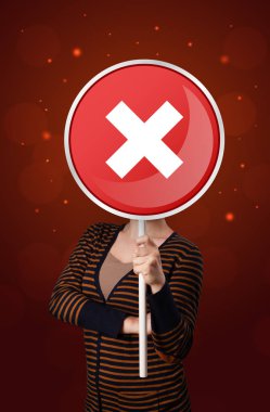 Tutan kadın x işareti