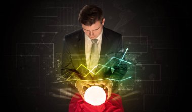 İşadamı borsa sihirli bir top ile geleceği tahmin