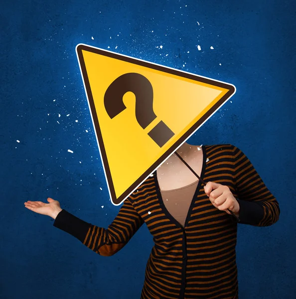 Woman holding question mark — Stock Photo, Image