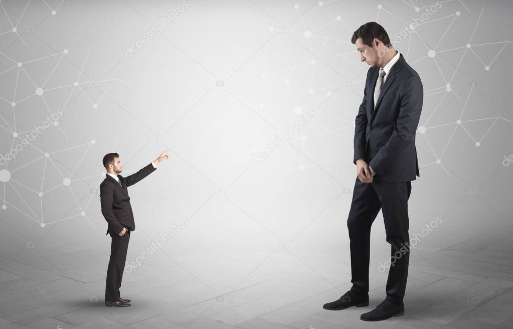 Small man aiming at a big man with network concept