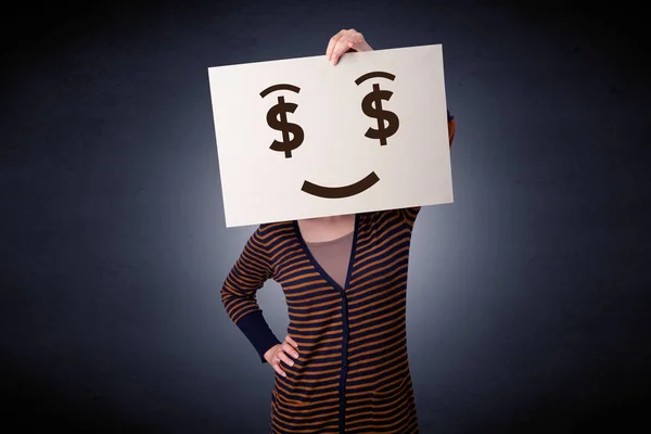 Kvinna som håller papper med giriga känslor — Stockfoto