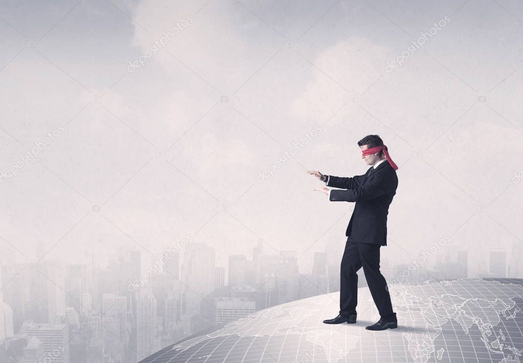 Blindfolded businessman concept