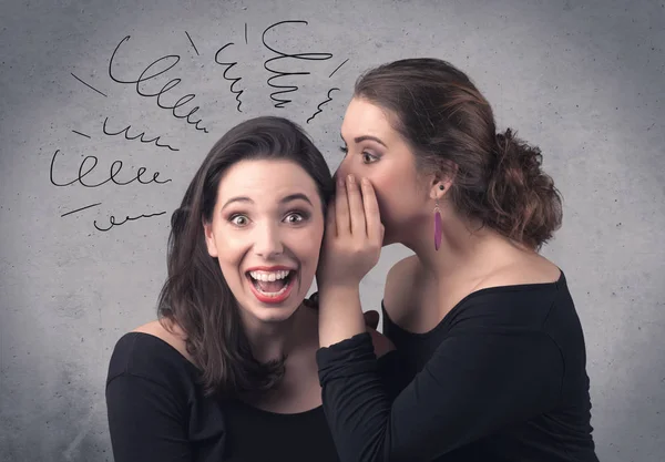 Girl telling secret things to her girlfriend — Stock Photo, Image