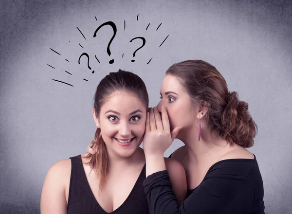 Girl telling secret things to her girlfriend — Stock Photo, Image