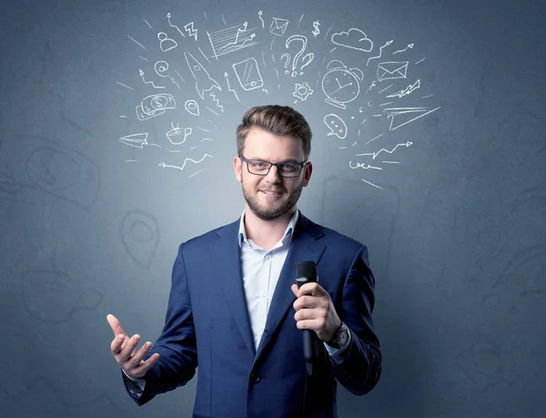 Businessman holding microphone — Stock Photo, Image