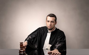 Oldscool young judge in gown clipart
