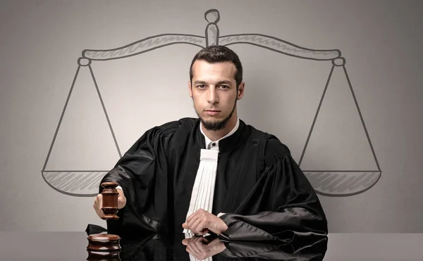 Young judge in gown deciding — Stock Photo, Image