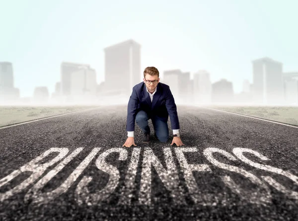 Businessman at start line — Stock Photo, Image