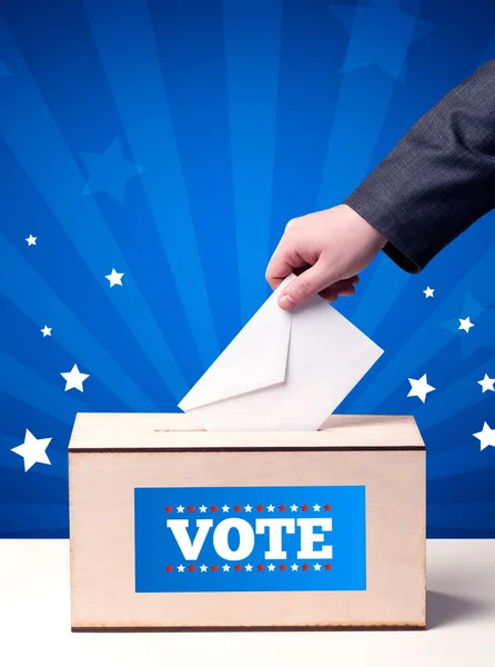 Hand with ballot and wooden box — Stock Photo, Image