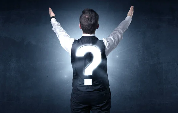 Man standing with question mark on his back — Stock Photo, Image