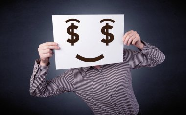 Aç gözlü duygu ile kağıt tutan işadamı 