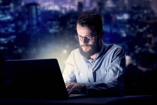 Businessman in the office at night — Stock Photo, Image