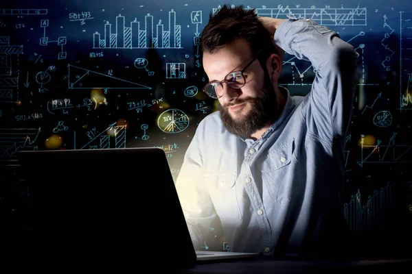 Businessman in the office at night — Stock Photo, Image