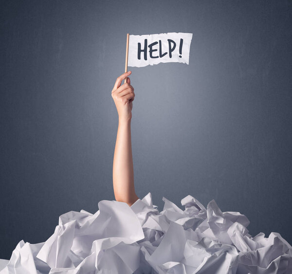 Female hand holding help sign