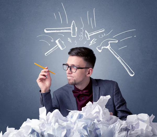 Businessman above crumpled paper — Stock Photo, Image