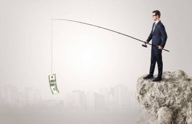 İşadamı Balık tutma Doları bir rock
