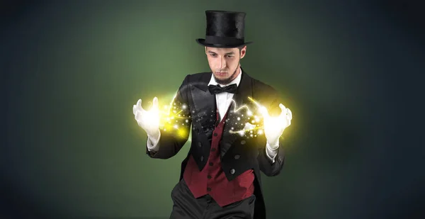 Magician holding his power on his hand — Stock Photo, Image