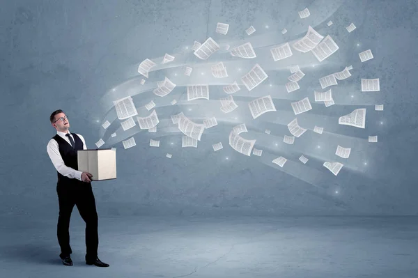 Business papers flying from box — Stock Photo, Image