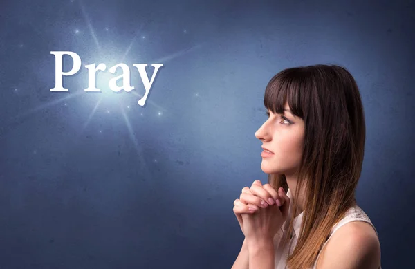 Modląc się młoda dziewczyna — Zdjęcie stockowe