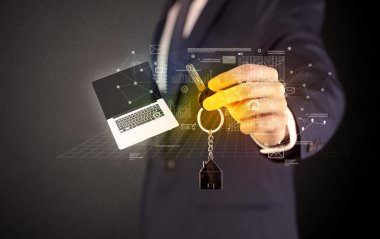 Grafikleriyle tuşu tutmakta işadamı