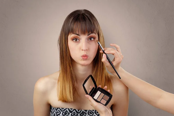 Portrait of a young woman at cosmetician — Stock Photo, Image
