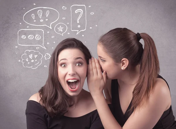 Girl telling secret things to her girlfriend — Stock Photo, Image