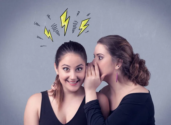 Girl telling secret things to her girlfriend — Stock Photo, Image