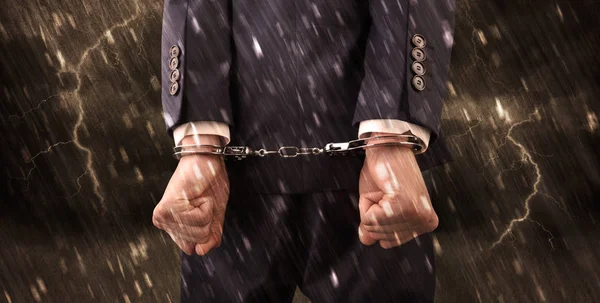 Stormy wallpaper with close handcuffed man — Stock Photo, Image