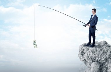 İşadamı Balık tutma Doları bir rock