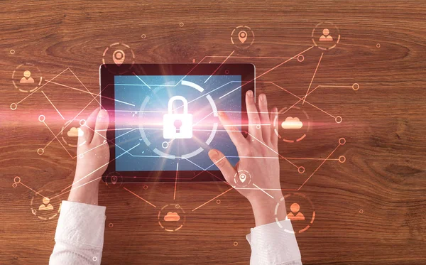 Hand using tablet with network security and online storage system concept — Stock Photo, Image