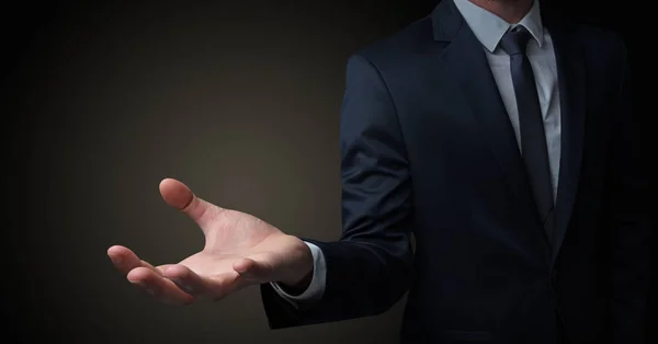 Businessman handing something without concept — Stock Photo, Image