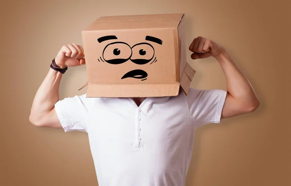 Man with cardboard head — Stock Photo, Image