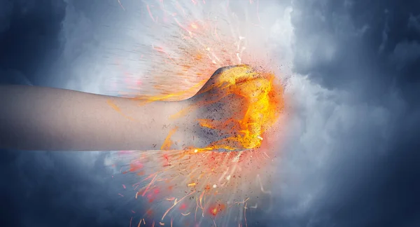 Hand hits intense and makes fire — Stock Photo, Image