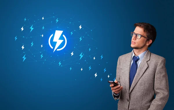 Person using phone with power concept — Stock Photo, Image