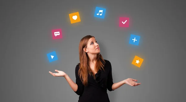 Person juggle with application icons — Stock Photo, Image