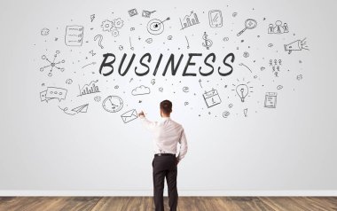 Yöneticisi iş kavramı ile bir duvara bakarak şüphe