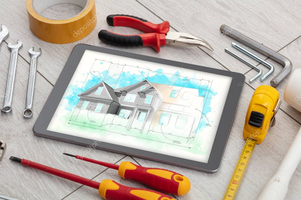Tablet and tools with house plan concept