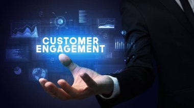 Motivasyon mesajı taşıyan iş adamının eli