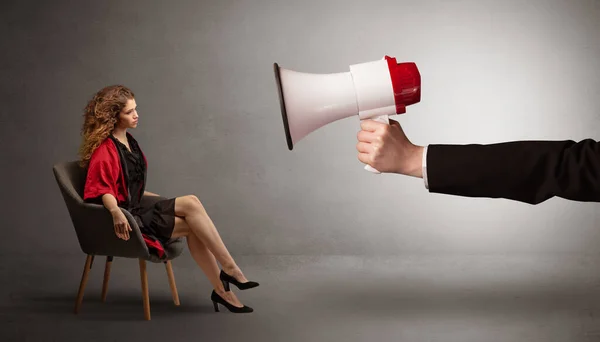 Elegant model sitting opposite with a big loudspeaker — Stock Photo, Image