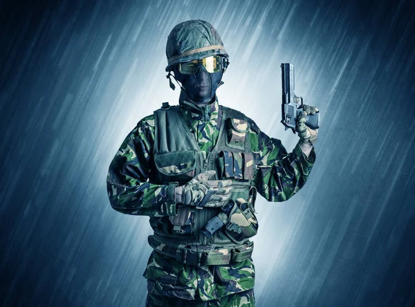 Soldier standing in rainy weather — Stock Photo, Image