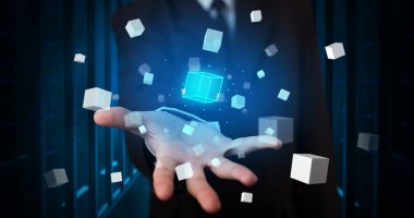 Küp hologram projeksiyonlar tutan kişi