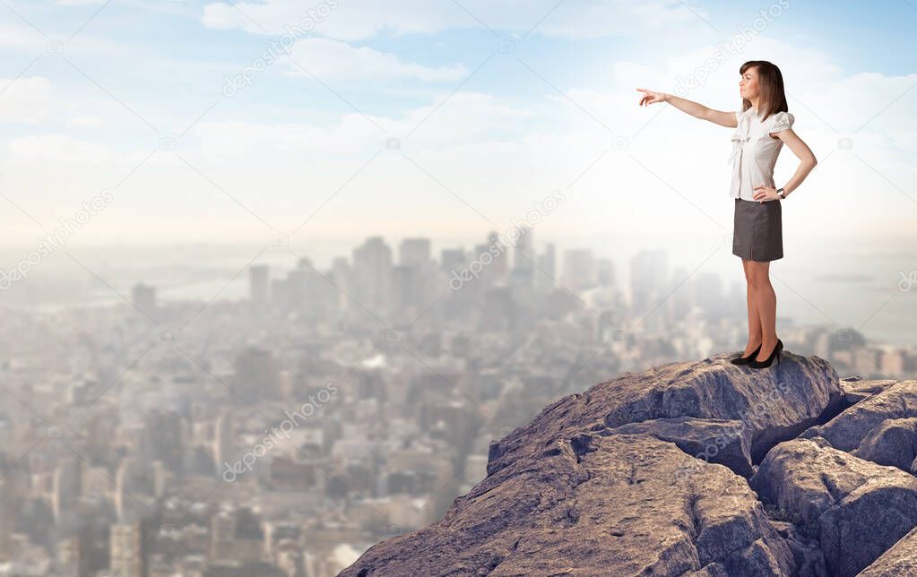 Business person looking to the city from distance