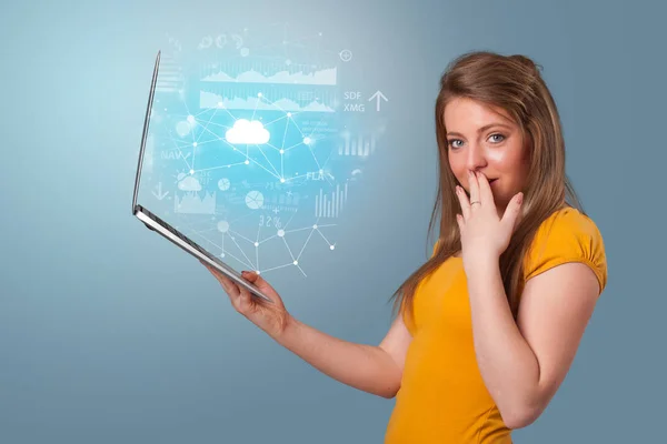 Woman holding laptop with cloud based system concept — Stock Photo, Image