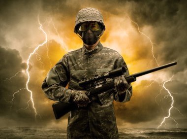 Silahlı asker anlaşılması güç bir havada duran