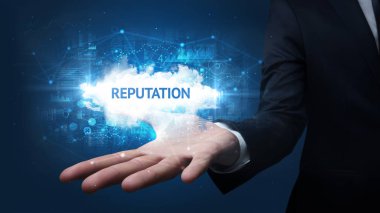 Motivasyon mesajı taşıyan iş adamının eli