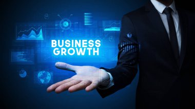 Motivasyon mesajı taşıyan iş adamının eli