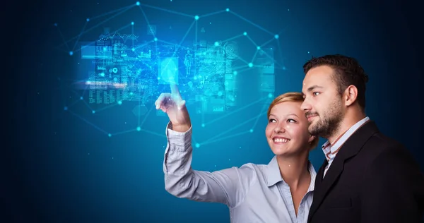 Man and woman accessing hologram with fingerprint — Stock Photo, Image