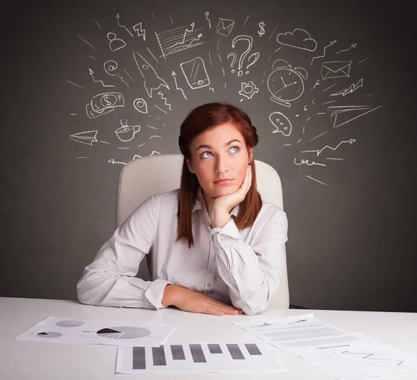 Manager in front of the office desk with direction concept — Stock Photo, Image